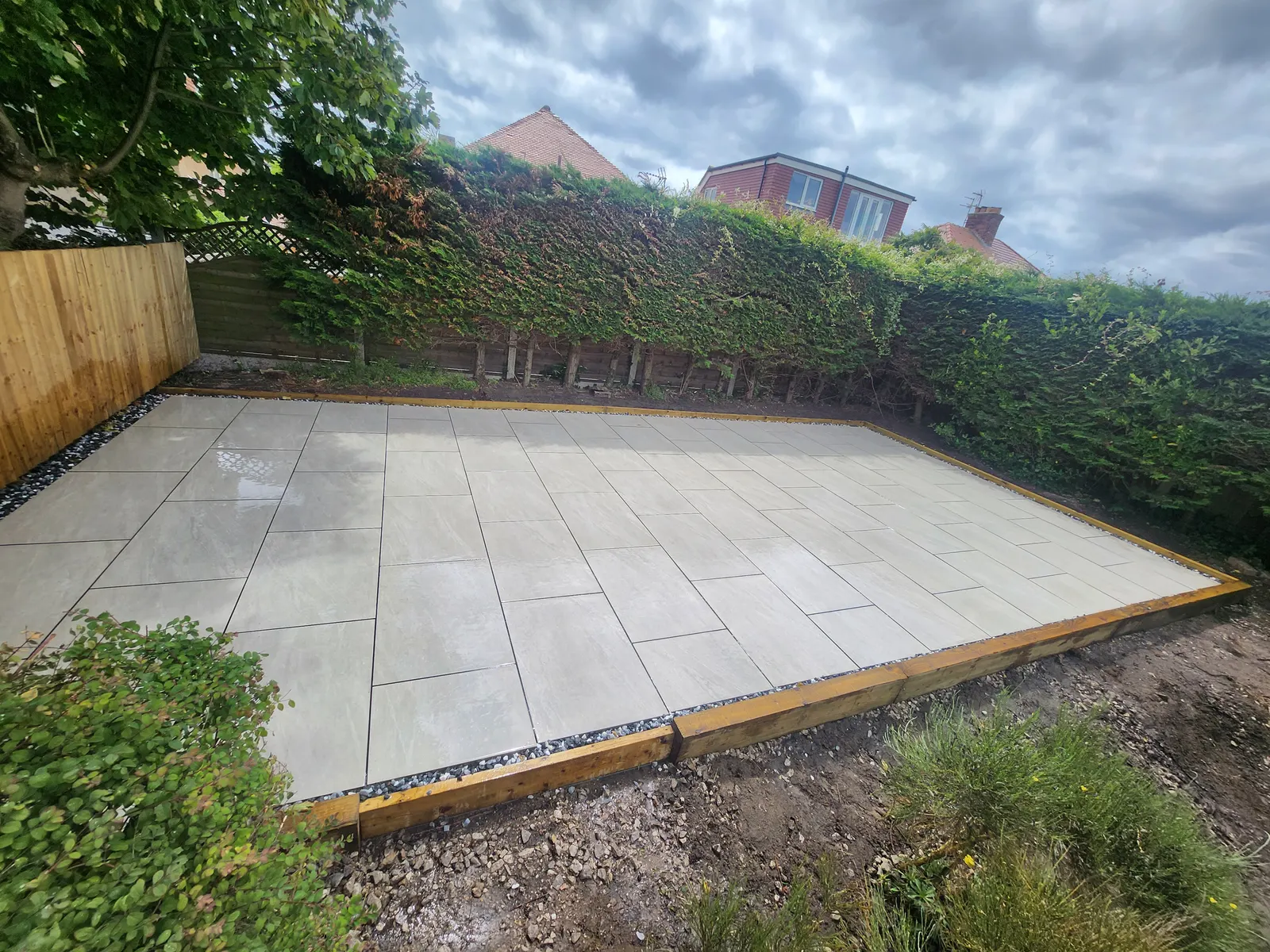 Completed paved patio and landscaped outdoor living space